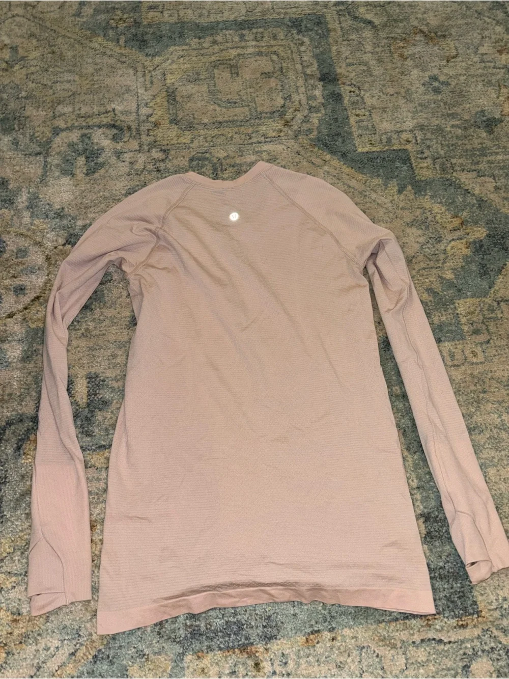 Light pink Lululemon swiftly top